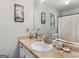 Bathroom featuring a sink with a marble countertop at 1000 Coan Dr, Locust Grove, GA 30248