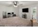 Bedroom featuring a bed, work space and an en suite bathroom at 1000 Coan Dr, Locust Grove, GA 30248