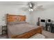 Comfortable bedroom with a bed and workspace at 1000 Coan Dr, Locust Grove, GA 30248