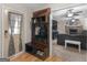 View of the front door showing the entry hall and storage nook; a living room beyond at 1000 Coan Dr, Locust Grove, GA 30248