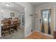 View of the front door and foyer showing an open view to the dining room at 1000 Coan Dr, Locust Grove, GA 30248