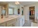 Double sink vanity, shower and walk in closet make this bathroom convenient and stylish at 116 Sophie Cir, Locust Grove, GA 30248