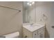 Clean bathroom with a white vanity, mirror, and ample lighting for a fresh start at 116 Sophie Cir, Locust Grove, GA 30248