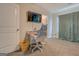 A versatile room with a TV, desk and gaming chair, perfect for work or play at 116 Sophie Cir, Locust Grove, GA 30248
