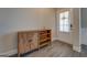 Welcoming entryway featuring a wooden cabinet and a view of the front door at 116 Sophie Cir, Locust Grove, GA 30248