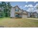 Charming two-story home featuring a brick facade, neutral siding, and a two-car garage at 116 Sophie Cir, Locust Grove, GA 30248