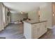 Open-concept kitchen flows into a living area, perfect for entertaining and Gathering gatherings at 116 Sophie Cir, Locust Grove, GA 30248