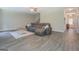 Spacious living room offers plenty of seating and access to other areas of the home at 116 Sophie Cir, Locust Grove, GA 30248