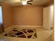 Bedroom featuring neutral walls, decorative rug, and door leading to another room at 2498 Robinhood Dr, Ellenwood, GA 30294