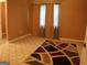 Bedroom with neutral walls and decorative rug at 2498 Robinhood Dr, Ellenwood, GA 30294