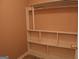 Organized closet featuring white shelving, offering storage solutions for an efficient and tidy home at 2498 Robinhood Dr, Ellenwood, GA 30294