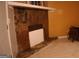 Stone fireplace with tile flooring and cream mantle at 2498 Robinhood Dr, Ellenwood, GA 30294
