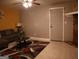 Living room with a fireplace, gray walls, and decorative rug at 2498 Robinhood Dr, Ellenwood, GA 30294