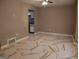 Bright living area featuring modern flooring and a view into the kitchen at 2498 Robinhood Dr, Ellenwood, GA 30294