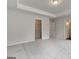 Large bedroom featuring a tray ceiling, neutral walls, and carpeted floor at 4454 Eastbrook Pl # 57B, Snellville, GA 30039