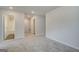 View of the upstairs hallway leading to the bathroom and bedrooms at 4454 Eastbrook Pl # 57B, Snellville, GA 30039