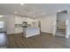 Modern kitchen with stainless appliances, stylish pendant lights, and a convenient island at 4454 Eastbrook Pl # 57B, Snellville, GA 30039