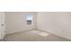 Bright bedroom featuring neutral walls and carpet and a window at 1939 Van Allen Ct, Dacula, GA 30019