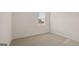Cozy bedroom with plush carpeting and a sunny window at 1939 Van Allen Ct, Dacula, GA 30019