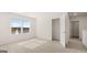 Upstairs bedroom with neutral carpet, walk-in closet, and a bright, sunny window at 1939 Van Allen Ct, Dacula, GA 30019