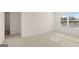 Spacious upstairs bedroom with walk-in closet, neutral paint, and plush carpeting at 1939 Van Allen Ct, Dacula, GA 30019