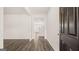 Entryway featuring hard surface flooring and a view of the living area at 1939 Van Allen Ct, Dacula, GA 30019