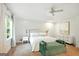 Spacious bedroom with a king bed, white walls, and neutral accents at 591 Clubwood Ct, Marietta, GA 30068