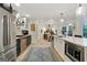 Bright kitchen with stainless steel appliances and a view into the dining area for easy entertaining at 591 Clubwood Ct, Marietta, GA 30068