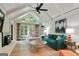 Bright living room with vaulted ceilings, fireplace and french doors to backyard patio at 591 Clubwood Ct, Marietta, GA 30068