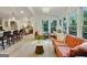 Open concept living space flows seamlessly from the kitchen to the sun room and dining area at 591 Clubwood Ct, Marietta, GA 30068