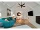 Comfortable living room featuring vaulted ceilings, painted brick fireplace and custom decor at 591 Clubwood Ct, Marietta, GA 30068