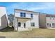 Exterior of white home featuring a well maintained backyard at 4434 Eastbrook Pl # 59A, Snellville, GA 30039