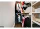 A well-organized walk-in closet with shelves, hanging rods, and plenty of storage space at 1821 Clearwater, Marietta, GA 30067