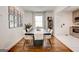 Stylish dining room with a modern table set and gallery wall at 1821 Clearwater, Marietta, GA 30067