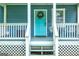 A inviting front porch with bright turquoise door at 1821 Clearwater, Marietta, GA 30067