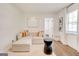 A cozy living room with a neutral color palette and modern decor at 1821 Clearwater, Marietta, GA 30067