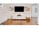 Bright living room features hardwood floors and built-in shelves at 1821 Clearwater, Marietta, GA 30067