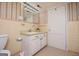 Retro bathroom featuring walk-in shower, tile flooring, and vanity with drawers at 508 College St, Bowdon, GA 30108