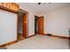 Dining room with wood trim and floors and with a doorway that leads to the next room at 508 College St, Bowdon, GA 30108