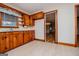 View of kitchen featuring stainless-steel appliances, wood cabinets, countertops and lots of natural light at 508 College St, Bowdon, GA 30108