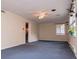 Cozy living room with staircase access, providing a functional layout for modern living at 508 College St, Bowdon, GA 30108