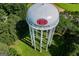 Close aerial view of the town water tower with the town name and logo at 508 College St, Bowdon, GA 30108