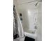Clean shower with built-in shelves and a shower curtain, ready for relaxation at 3929 Rockey Valley Dr, Conley, GA 30288