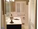 Bathroom featuring white tiling and plantation shutters at 276 Colewood Nw Way, Atlanta, GA 30328
