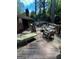 Spacious wooden deck with outdoor furniture and serene backyard view at 276 Colewood Nw Way, Atlanta, GA 30328