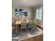 Bright dining room with a modern light fixture and artwork at 276 Colewood Nw Way, Atlanta, GA 30328
