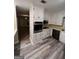 White kitchen featuring oven, and stainless steel appliances at 276 Colewood Nw Way, Atlanta, GA 30328