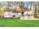 Charming brick home with a well-manicured lawn, inviting entrance, and ample natural light at 3645 Croft Nw Pl, Atlanta, GA 30331