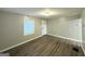 Inviting living room with modern flooring, neutral walls, and bright window at 3645 Croft Nw Pl, Atlanta, GA 30331