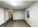 Bright living room with hard floors, neutral walls, and ample natural light from window at 3645 Croft Nw Pl, Atlanta, GA 30331